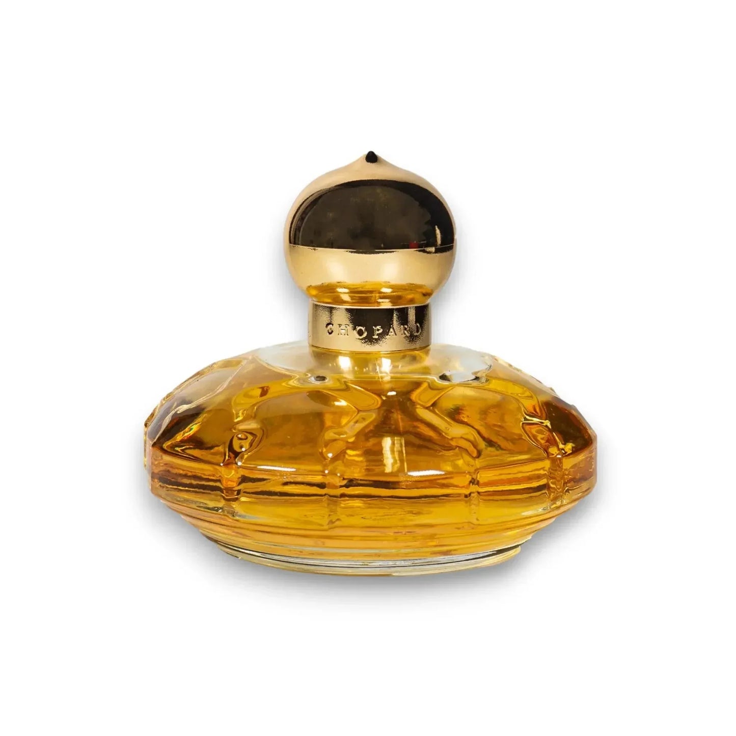 Luxuriöses Parfum-Flakon aus Glas mit goldenem Verschluss, gefüllt mit amberfarbener Duftflüssigkeit.