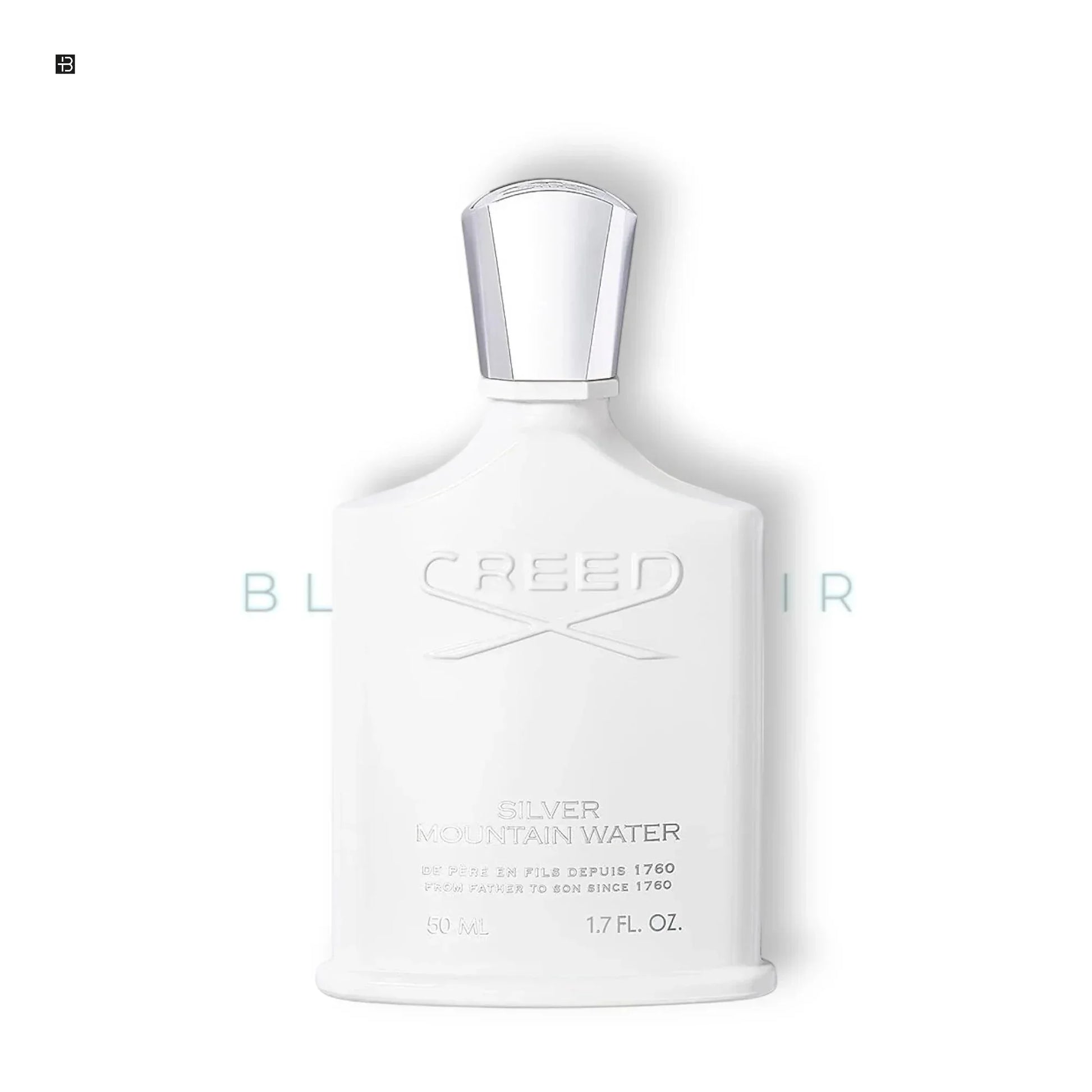 Weißer Flakon eines luxuriösen Parfums, glänzender Verschluss, Aufschrift Silver Mountain Water.