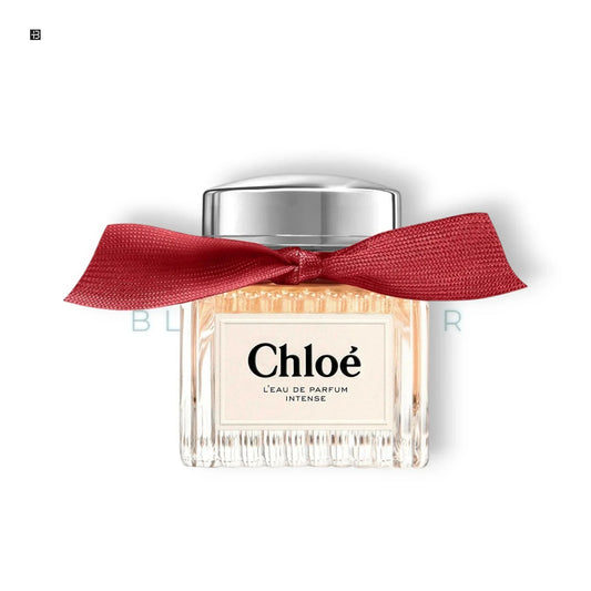 Luxus Damenparfum Flakon mit silbernem Deckel und roter Schleife, Duft für Frauen