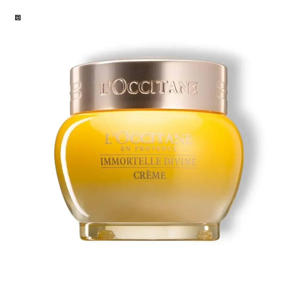 Gelbes Creme-Glas mit goldenem Deckel, Aufschrift Immortelle Divine Crème, luxuriöse Pflege