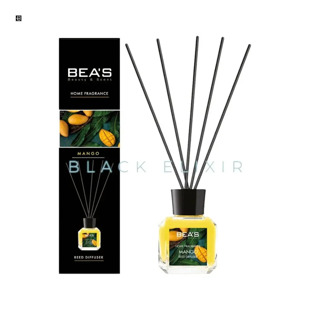 Raumduft Mango Reed Diffuser mit gelber Flüssigkeit und schwarzen Stäbchen, Geschenkbox daneben