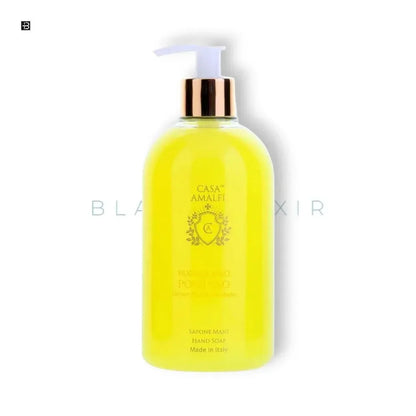 Gelbe Flüssigseife in transparentem Spender mit goldener Pumpe, Casa Amalfi, Zitrusduft