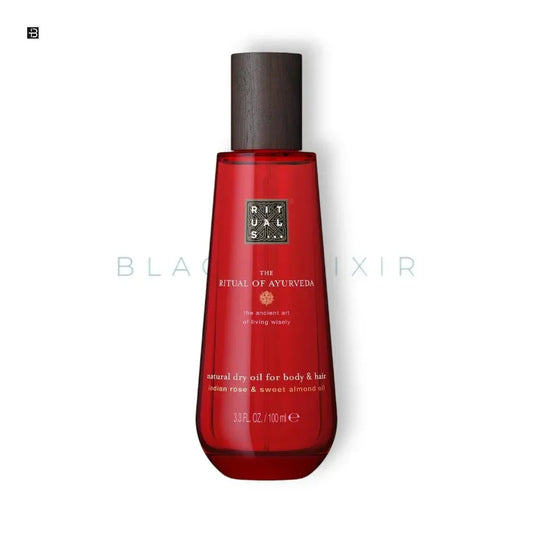 Rotes Flakon Rituals The Ritual of Ayurveda Trockenöl für Körper und Haare, elegantes Design