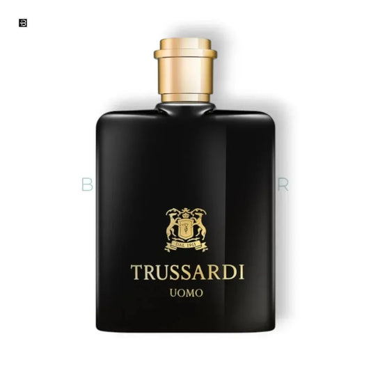 Elegantes Herrenparfum Trussardi Uomo in schwarzem Flakon mit goldener Kappe und Logo.