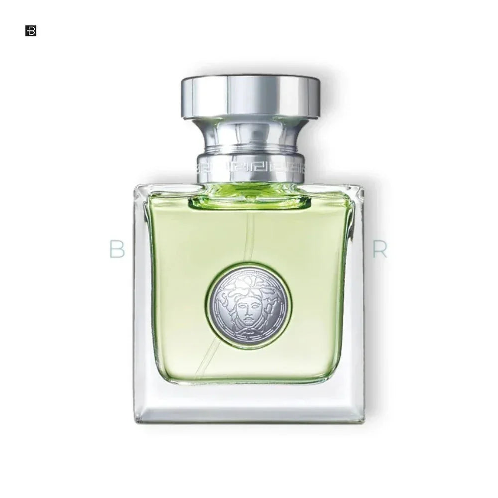 Luxus Parfumflakon mit silbernem Verschluss und grünem Duft, Medusa-Emblem auf der Flasche