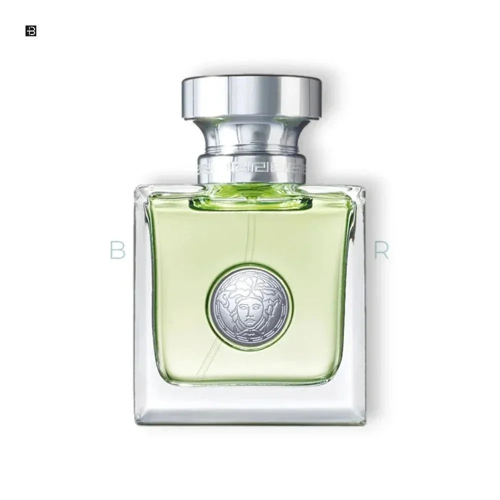 Luxuriöses Parfumflakon mit silbernem Verschluss und grünem Duft, edles Design, Herrenduft