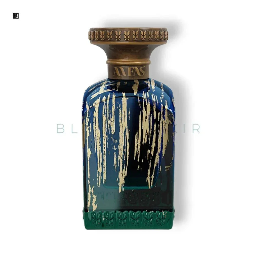 Luxus Parfumflakon in Blau und Gold, exklusives Design, Unisex Duftflasche vor weißem Hintergrund
