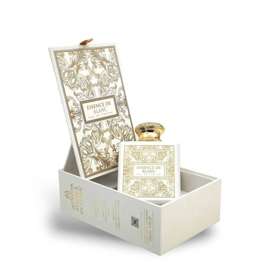 Luxuriöser Parfumflakon Essence de Blanc in eleganter, gold-verzierter Geschenkbox