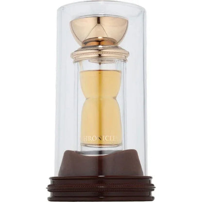 Luxusparfum Flakon in Sanduhrform mit goldfarbenem Verschluss in glasklarem Display