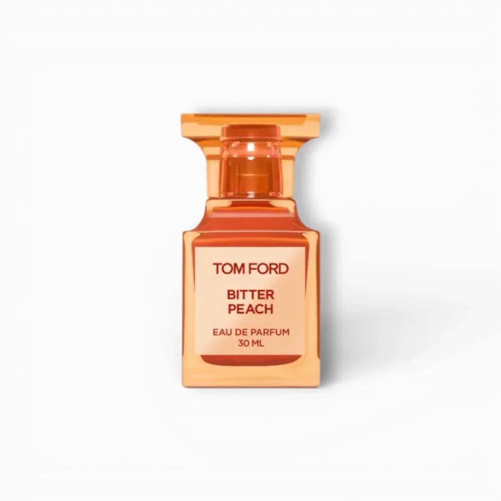 Tom Ford Bitter Peach Eau de Parfum in einem orangefarbenen Glasflakon.