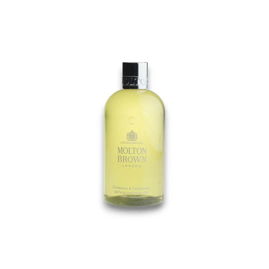 Molton Brown Cardamom & Cedarwood Duschgel in transparenter Flasche auf weißem Hintergrund