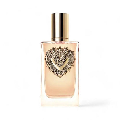 Luxus Parfumflakon mit goldener Herzverzierung, elegantes Damenparfum