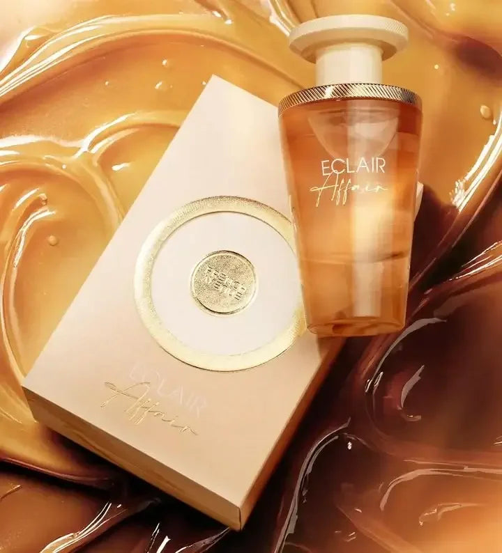 Luxusparfum Eclair Affair Flakon und Verpackung, goldene Töne, elegant, edles Damenparfum