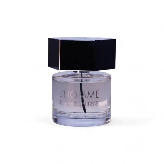 L'Homme Eau de Toilette Herrenduft, runder Glasflakon mit schwarzem Verschluss, minimalistisch