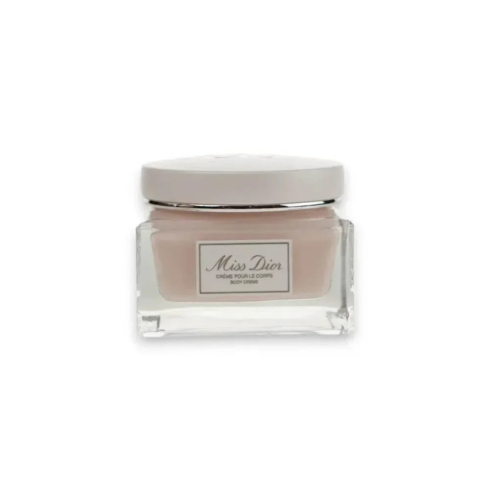 Miss Dior Körpercreme im eleganten Glasbehälter mit weißem Deckel, Produktfoto vor weißem Hintergrund.