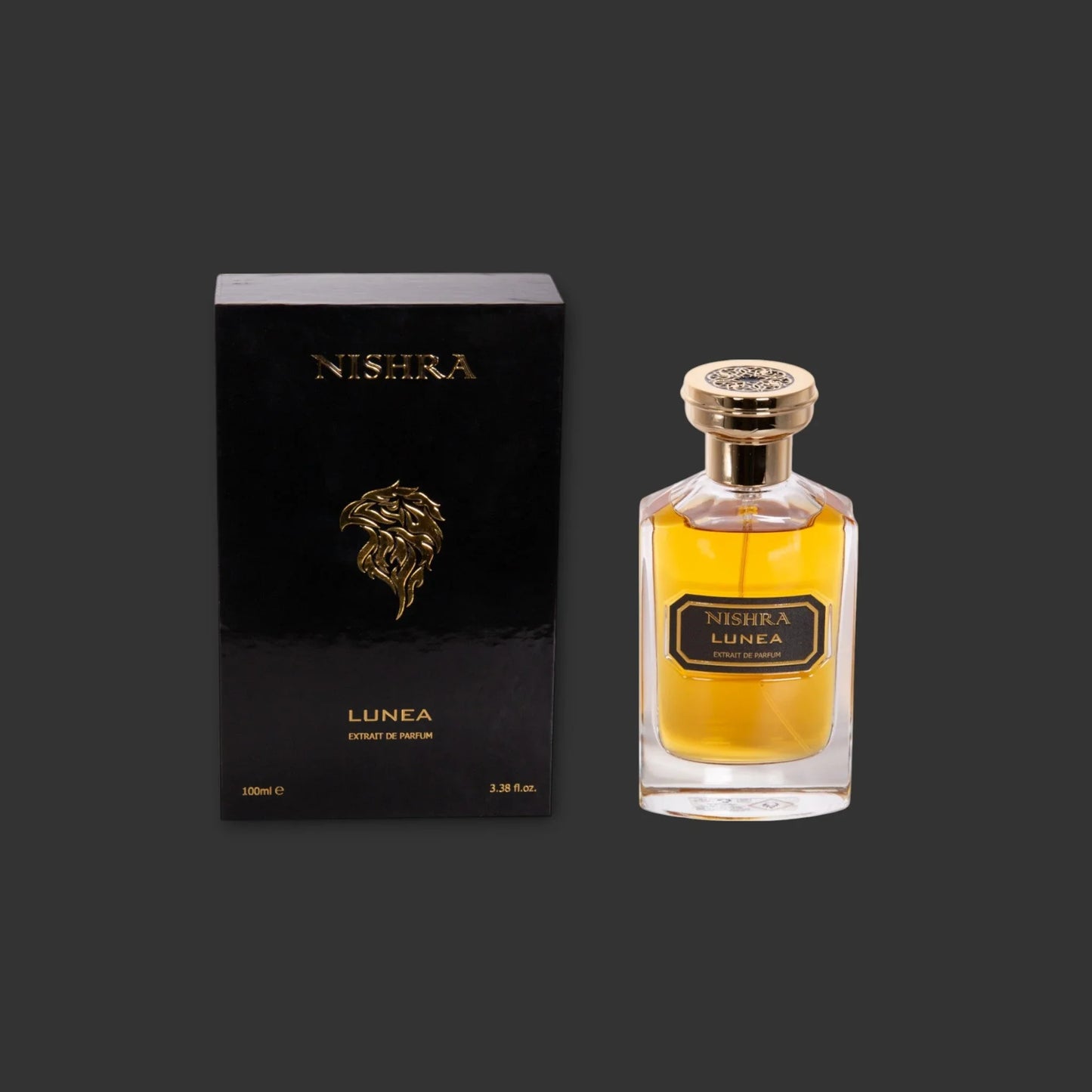 Nishra Lunea Parfumflakon und schwarze Verpackung mit goldenen Details vor dunklem Hintergrund