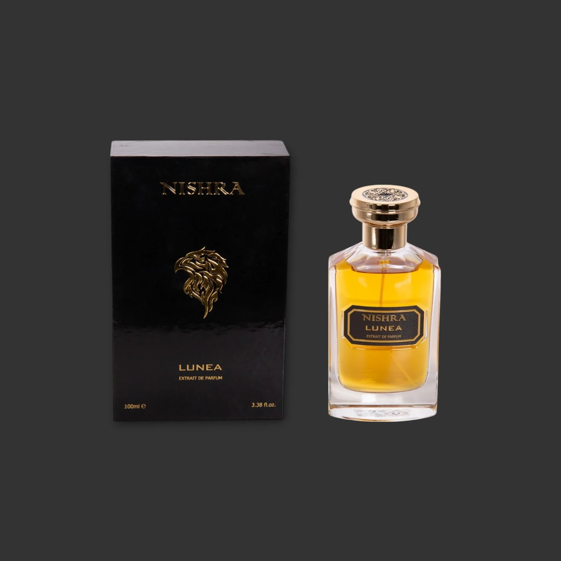 Nishra Lunea Parfumflakon und schwarze Verpackung mit goldenen Details vor dunklem Hintergrund