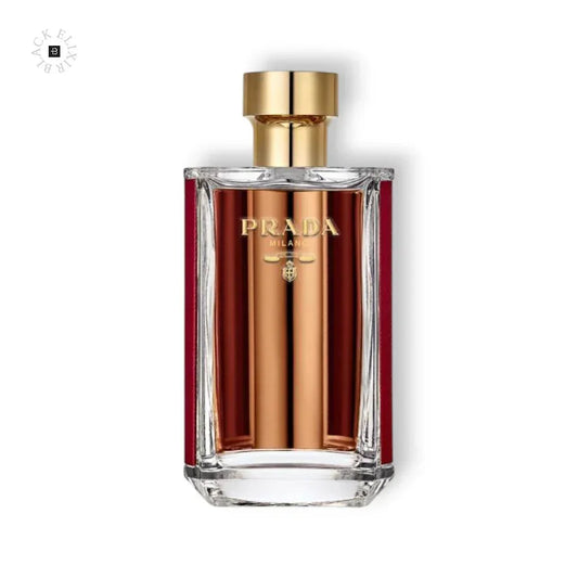 Edles Damenparfum in eleganter Glasflasche mit goldfarbenem Verschluss und rotem Akzent