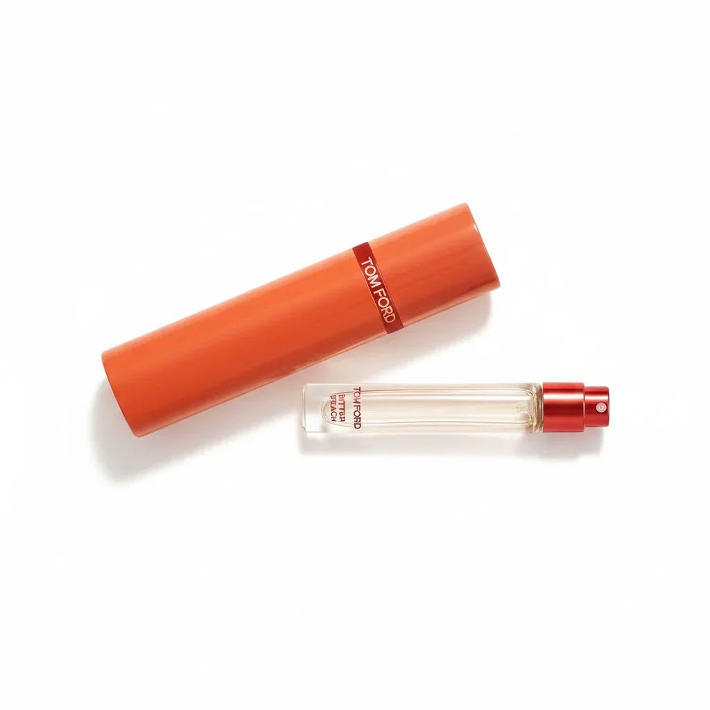 Tom Ford Private Blend Bitter Peach Eau de Parfum Probe mit orangefarbenem Deckel.