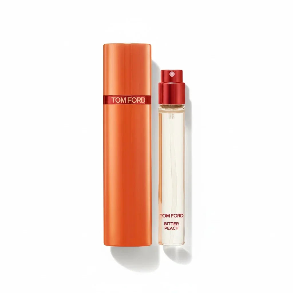 Tom Ford Bitter Peach Eau de Parfum Probe mit orangefarbenem Verschluss.