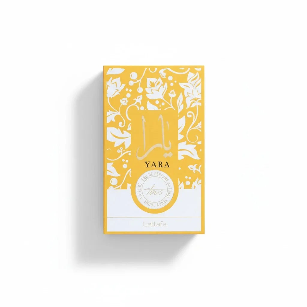 Gelbe Verpackung des Lattafa Yara Tous Eau de Parfum mit floralen Ornamenten.