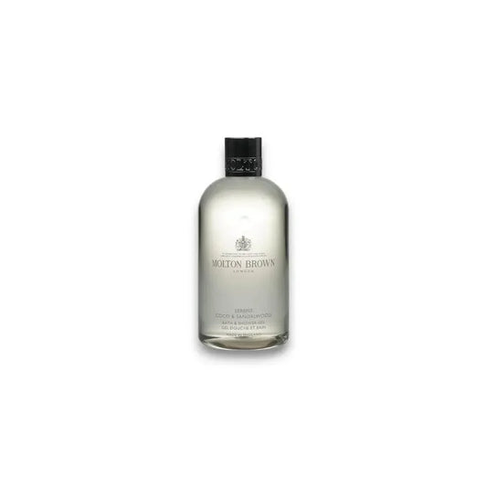 Molton Brown Serene Coco & Sandalwood Duschgel in transparenter Flasche auf weißem Hintergrund
