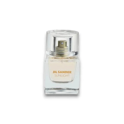 Jil Sander Sunlight Eau de Parfum Flakon, exklusives Damenparfum vor weißem Hintergrund
