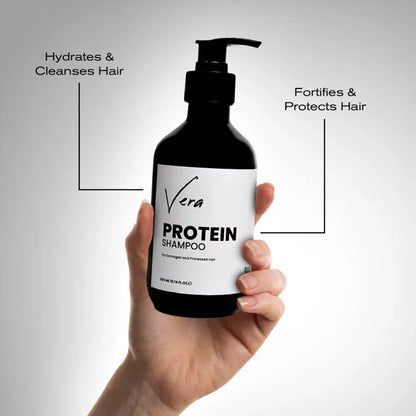 Hand hält schwarze Flasche Vera Protein Shampoo, weißes Label, Vorteile für Haarpflege