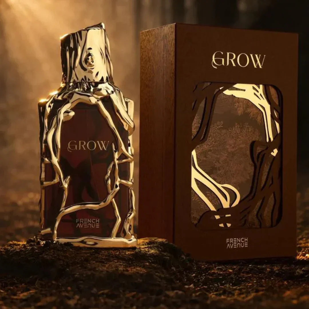 Luxusparfum Flakon mit goldener Verzierung und edler Geschenkbox im Naturlicht