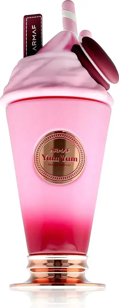 Luxus Parfumflakon in Pink, inspiriert von einem Milkshake, mit Strohhalm und Macaron-Verzierung