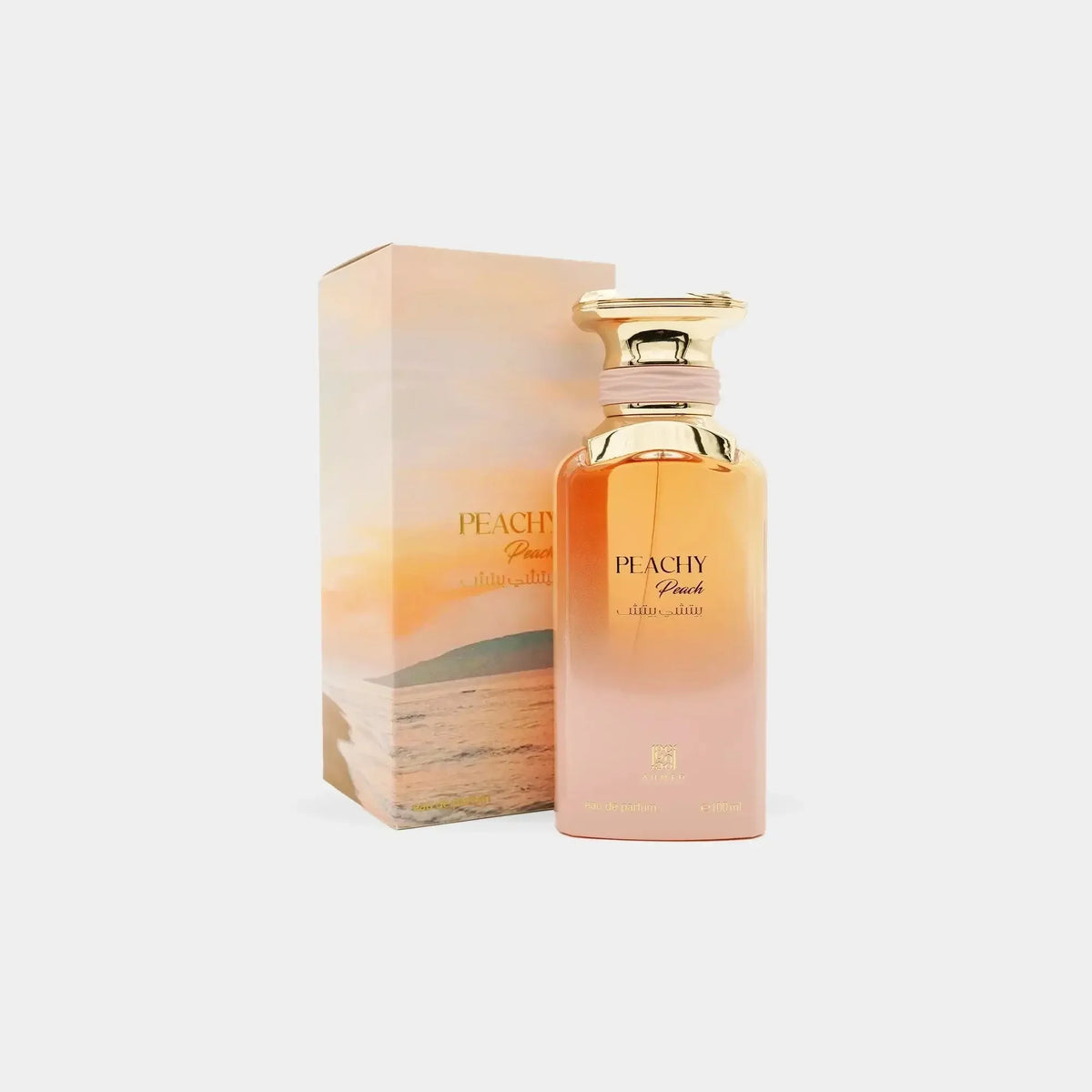 Luxus Parfumflakon Peachy Peach 100ml mit goldenen Akzenten und passender Verpackung