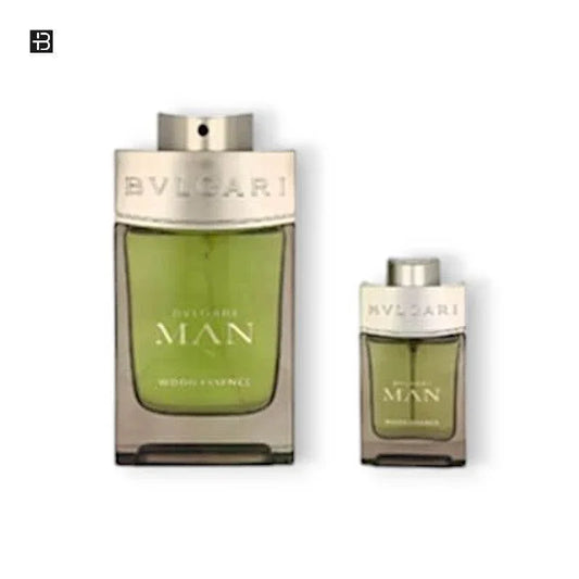 Zwei Flakons Parfum Man Wood Essence mit grünem Inhalt und silbernem Verschluss
