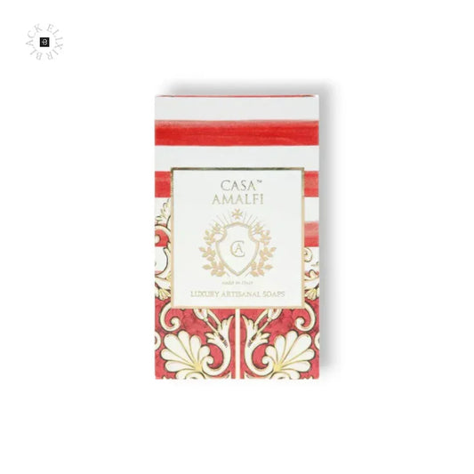 Luxuriöse Seife in dekorativer Verpackung mit rotem Muster und goldenen Ornamenten.