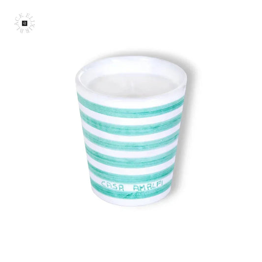 Handbemalte Duftkerze im grünen Streifendesign, elegantes Wohnaccessoire.