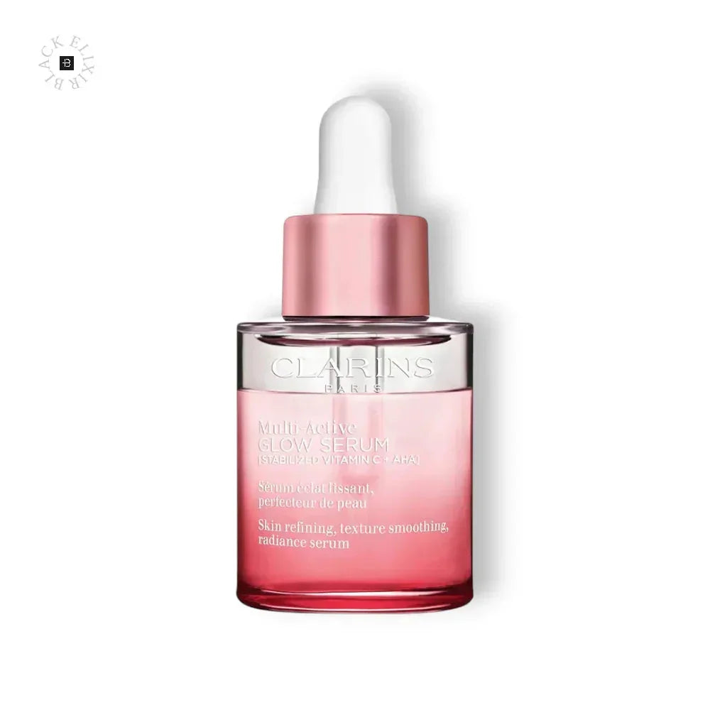 Rosa Flasche Clarins Multi-Active Glow Serum mit Pipette, Hautpflege Produkt auf weißem Hintergrund