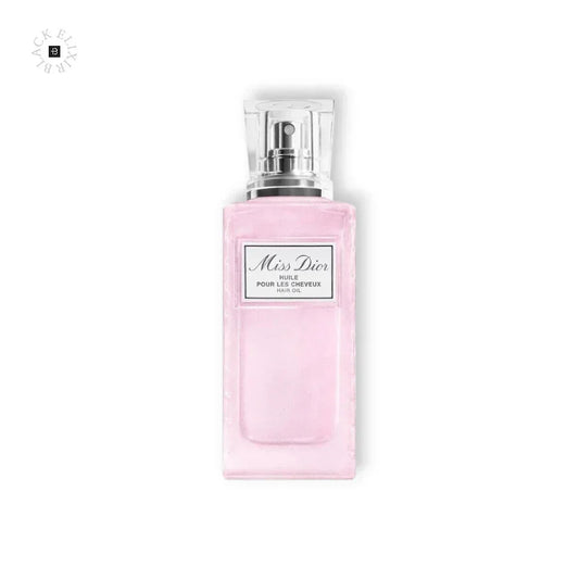 Miss Dior Hair Oil in elegantem, rosa Glasflakon mit Pumpspender, Produktfoto auf Weiß