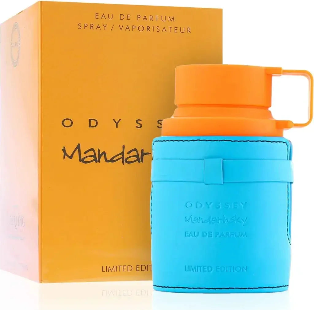 Odyssey Mandarin Eau de Parfum Flakon in Blau und Orange vor gelber Verpackung, Luxusparfum
