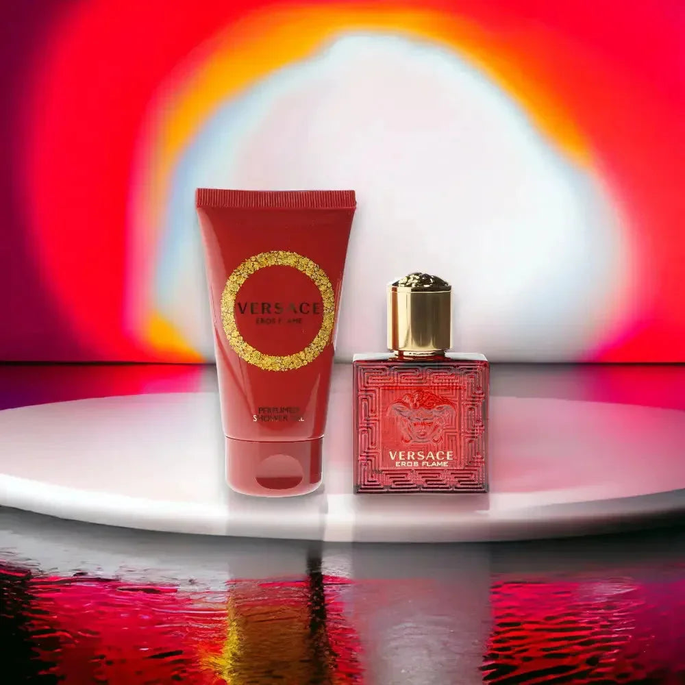 Versace Eros Flame Duftset mit Parfüm und Duschgel in Rot vor buntem Hintergrund