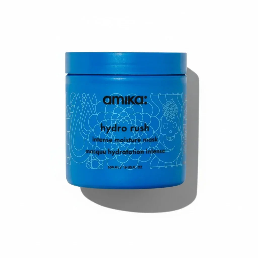 Blaue Dose der Amika hydro rush intense moisture mask gegen Haartrockenheit.