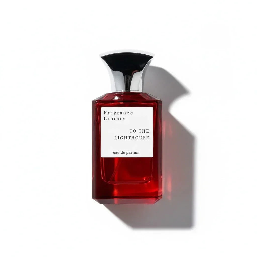 Roter Glasflakon des Fragrance Library To The Lighthouse Eau de Parfum mit weißem Etikett.