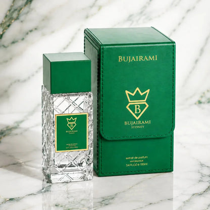 Bujairami Sydney Extrait de Parfum in grüner Verpackung auf Marmor, luxuriöser Duft für Damen & Herren