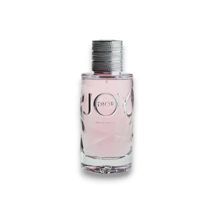 Joy by Dior Eau de Parfum Flakon mit rosa Parfum für Damen vor weißem Hintergrund