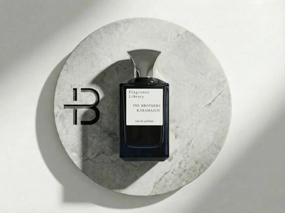 Edles Parfumflakon The Brothers Karamazov auf rundem Stein, moderner Luxusduft für Herren