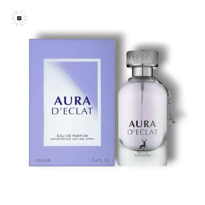 Aura D'Eclat Eau de Parfum 100ml Flakon neben lilafarbener Parfümverpackung auf schwarzem Hintergrund