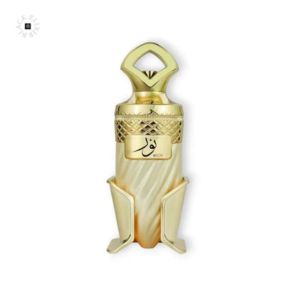 Luxuriöser Parfumflakon in Gold und Perlmutt mit arabischer Aufschrift, edles Design