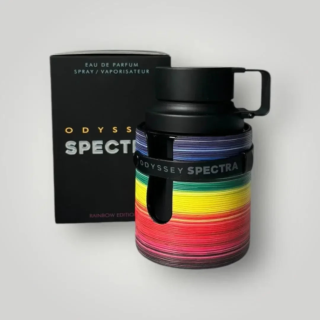 Odyssey Spectra Parfumflakon Rainbow Edition mit bunter Streifenoptik, vor schwarzer Verpackung