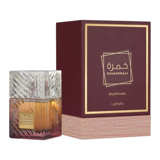 Lattafa Khamrah Dukhan Eau de Parfum 100ml bottle and packaging, highlighting a unisex fragrance with rich, smoky notes.
