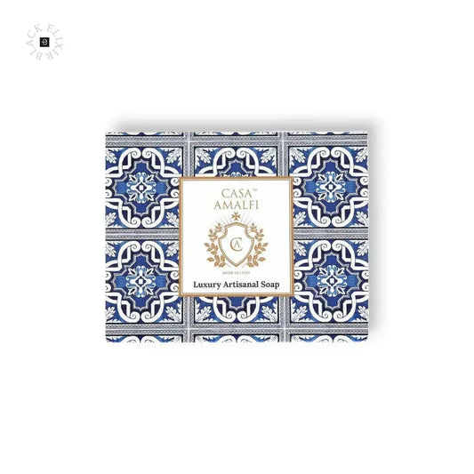 Luxuriöse Seife mit blau-weißem, mediterranem Fliesenmuster und elegantem Etikett.