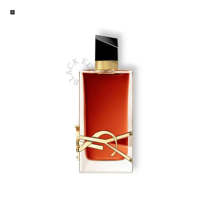 Luxusparfum Flakon in rechteckiger Form mit goldener Verzierung und schwarzem Verschluss, elegantes Design.