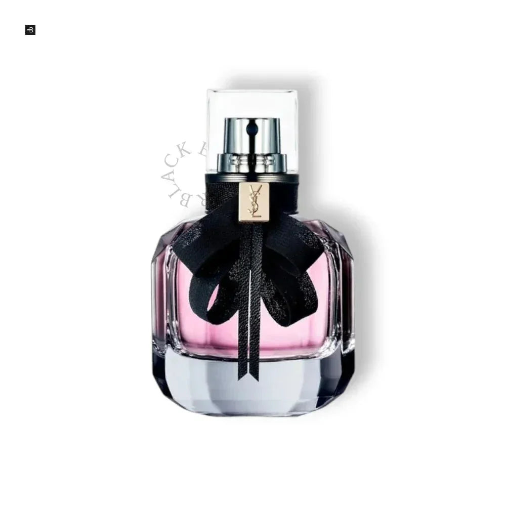 Luxuriöses Damenparfum in edlem, facettiertem Glasflakon mit rosa Duft und schwarzer Schleife